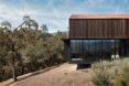 home with glass-enclosed ground floor