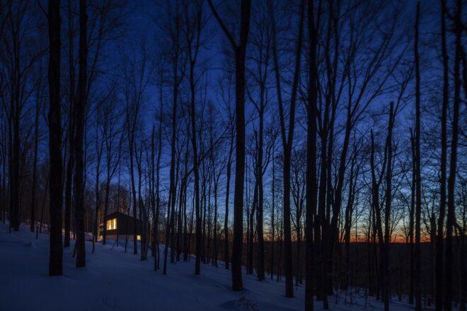 landscape shot of the home at night