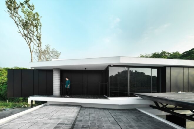 home with black walls and white roof