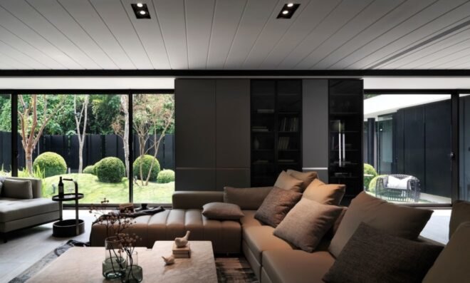 tan leather sofa in a gray living room
