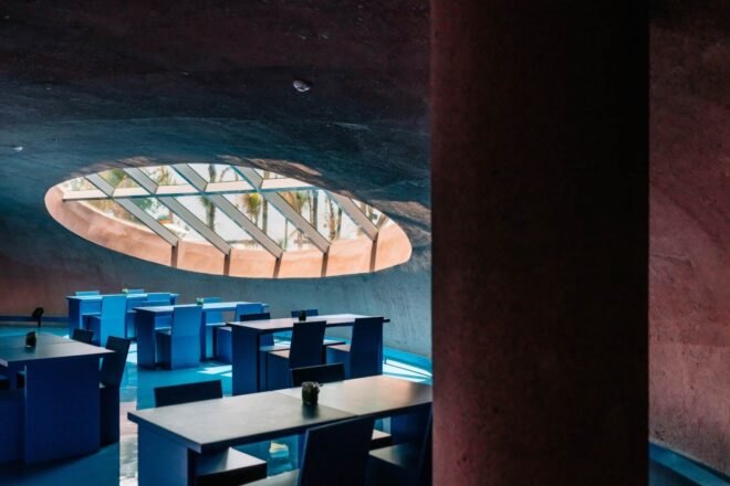 large round skylight in dark blue room
