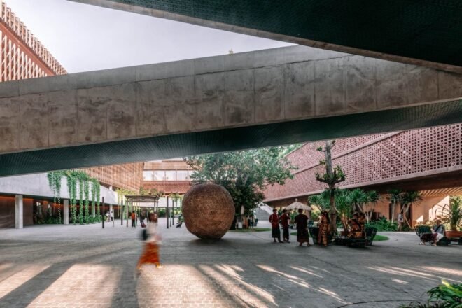 large courtyard with wood sculptures