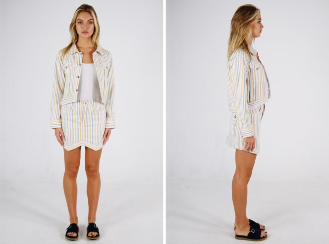 person wearing colorful striped jacket with matching skirt