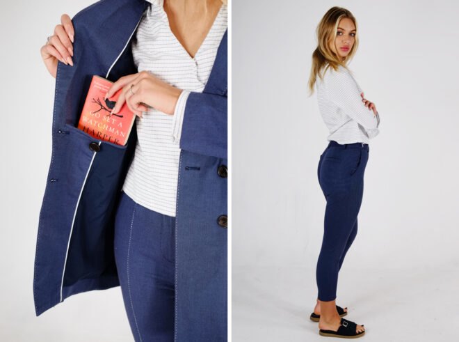 person wearing tailored navy jacket and pants with a white and gray striped blouse