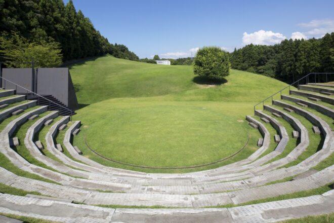 open amphitheater facing green hills