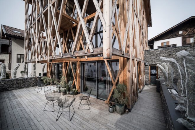 wood patio with small dining set