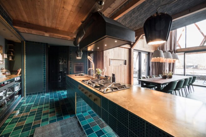 kitchen with blue tiles and wood countertops