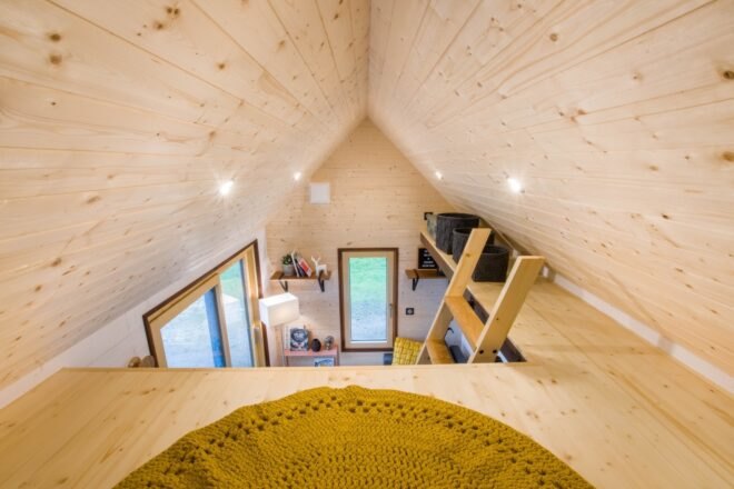 sleeping loft inside vaulted ceiling
