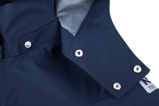 metal hood snaps on a blue jacket
