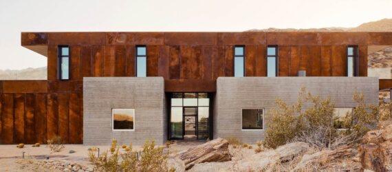 home with concrete base and weathered steel second floor
