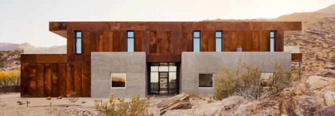 home with concrete base and weathered steel second floor
