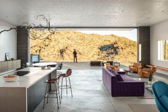 open living plan with kitchen island and sofas