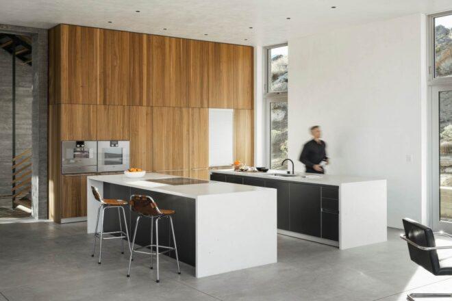 modern kitchen with two islands and seating