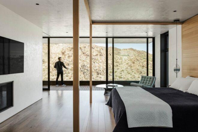 bedroom with all glass wall