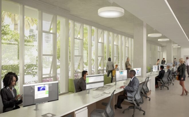 rendering of people working at computers on a long white desk