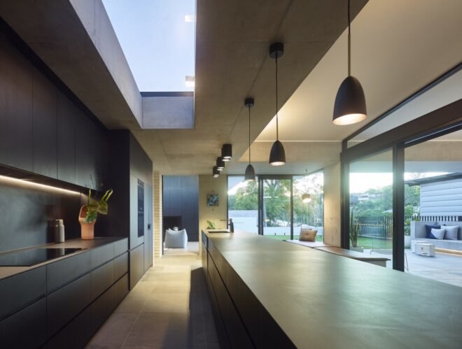 kitchen with dark gray cabinets and countertops