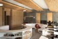 a room with a white S-shaped row of cabinets and built-in wall storage
