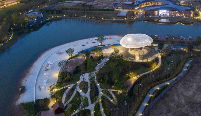aerial image of waterfront pavilion and beach