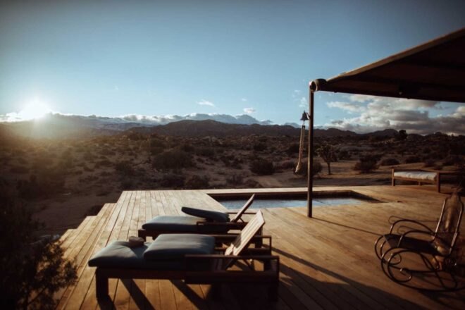 sun setting on outdoor deck space