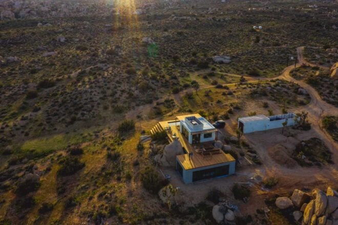 aerial shot of structure in middle of desert