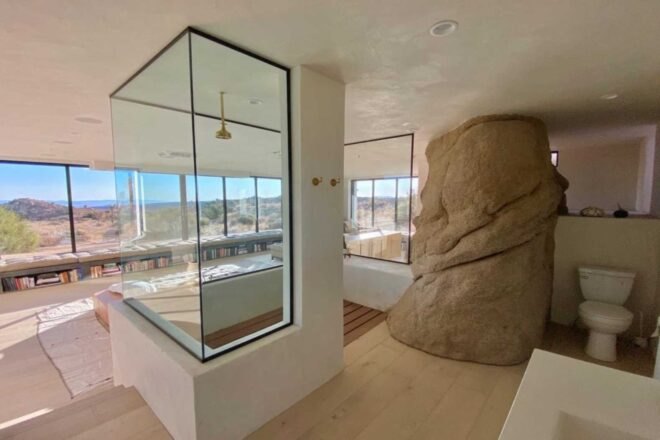 glass shower stall in massive bathroom