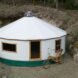 aerial shot of white yurt