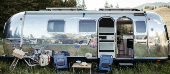 renovated airstream trailer with seating out front