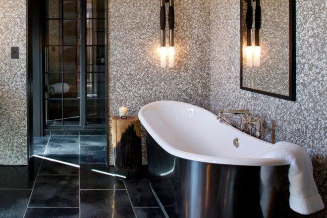 large bathroom with black soaking tub