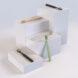 recycled plastic toothbrushes on pedestals