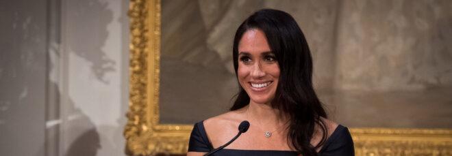 Meghan Markle speaking at a podium