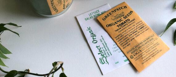 organic seed packets in glass jars