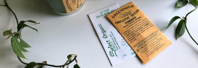 organic seed packets in glass jars