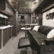 luxurious interior with black sofa and grey accents
