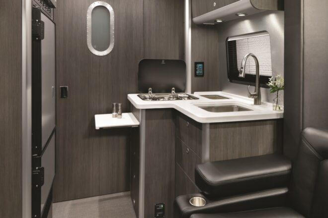 small bathroom with dark grey and black accents