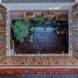 aerial view of brick courtyard filled with plants
