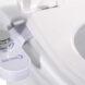 closeup of a bidet attachment for the toilet