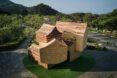 wooden structure with several wood volumes with pitched roofs
