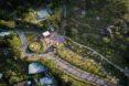 aerial shot of lush landscaped garden and walkway