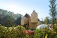 building made out of several wooden volumes