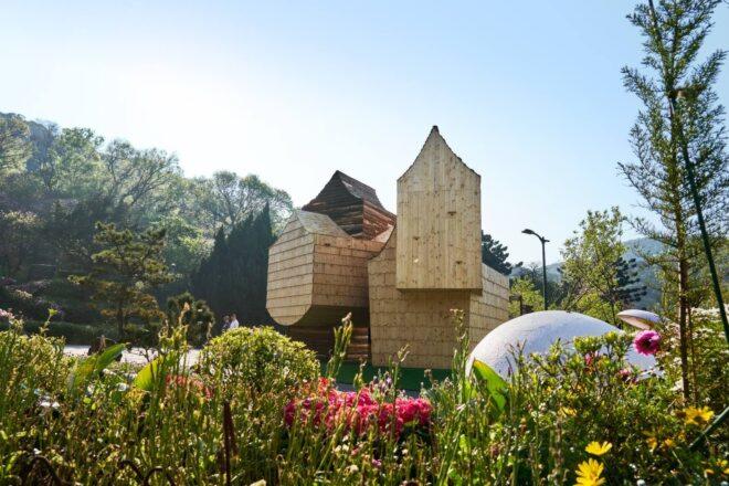 building made out of several wooden volumes