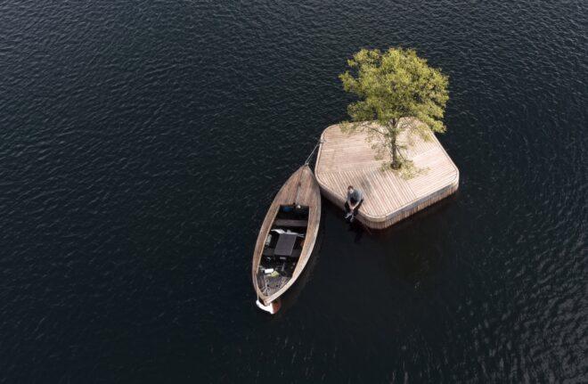 boat near floating wood platform