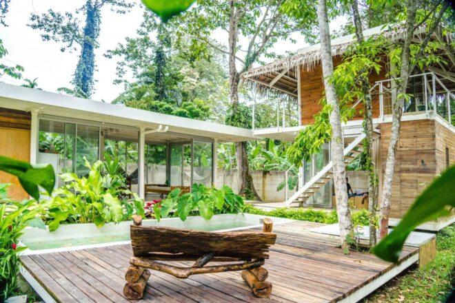 courtyard with wooden bench and swimming pool
