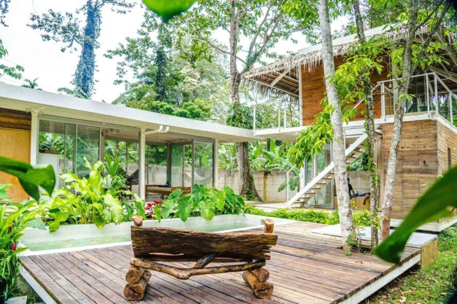 courtyard with wooden bench and swimming pool
