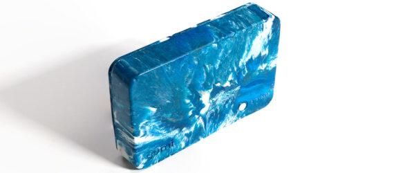 a blue and white marbled charger