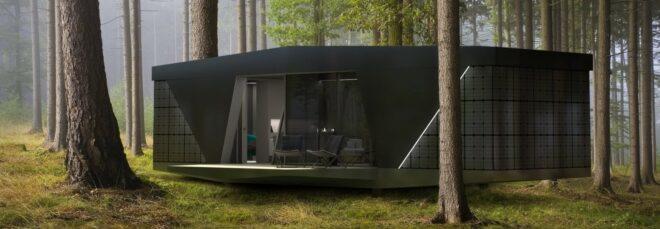 black tiny home in forest