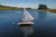 raft with triangular canopy made out of paper