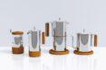 display of silver coffee pots with cork handles and bases