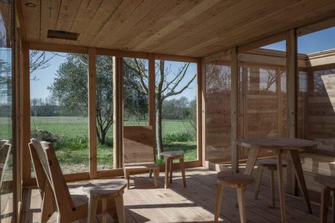 interior space with wall made up of sliding glass doors
