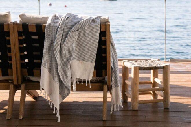 back of bench with blanket hung on it