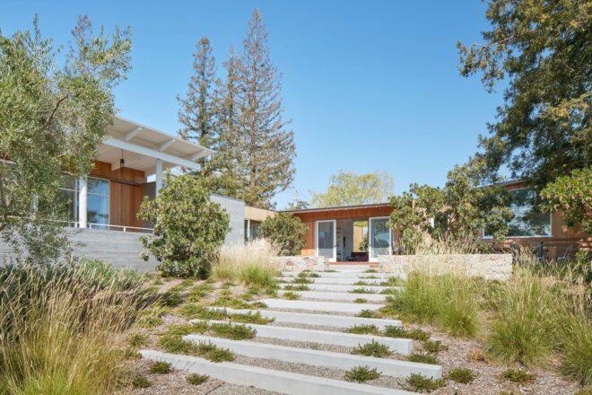 landscaped walkway leading up to home